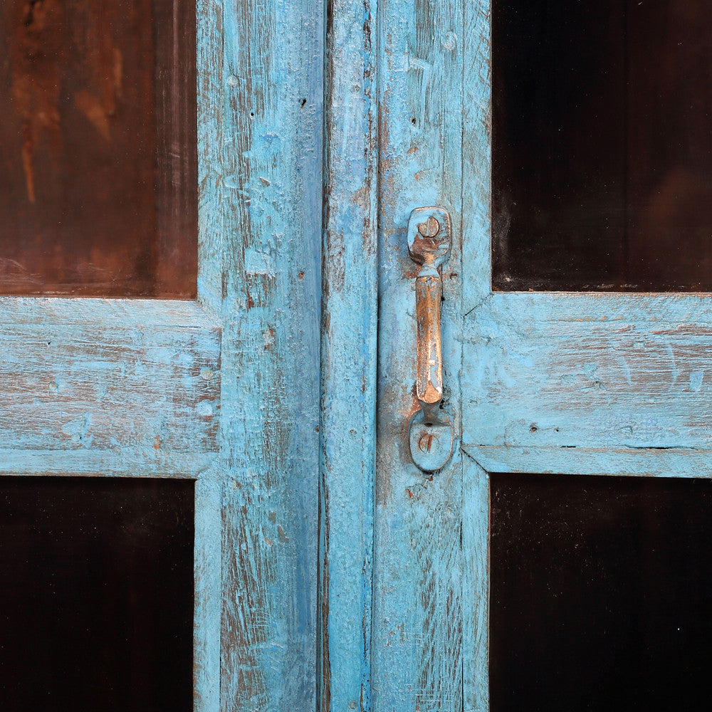 Blue Glass Paneled Cabinet