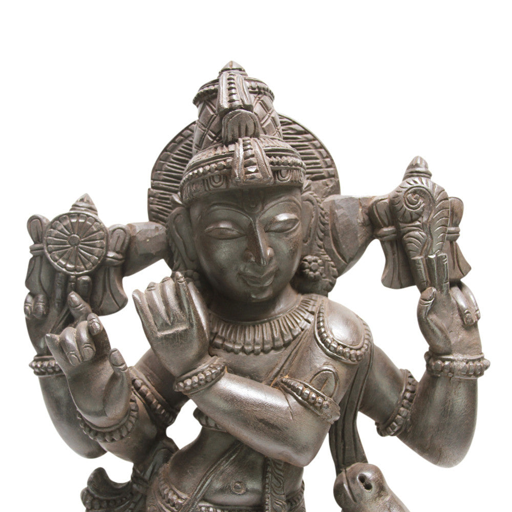 Ebonized Krishna Carved Statue