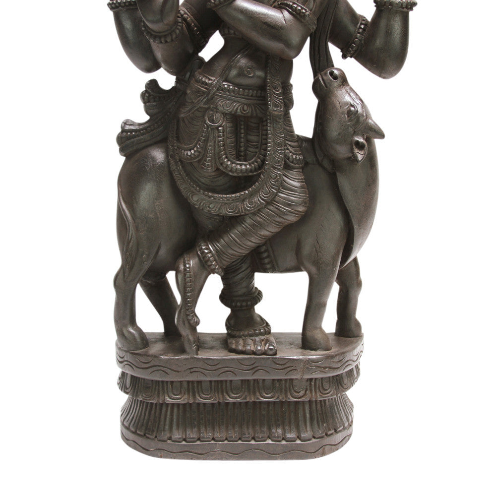 Ebonized Krishna Carved Statue