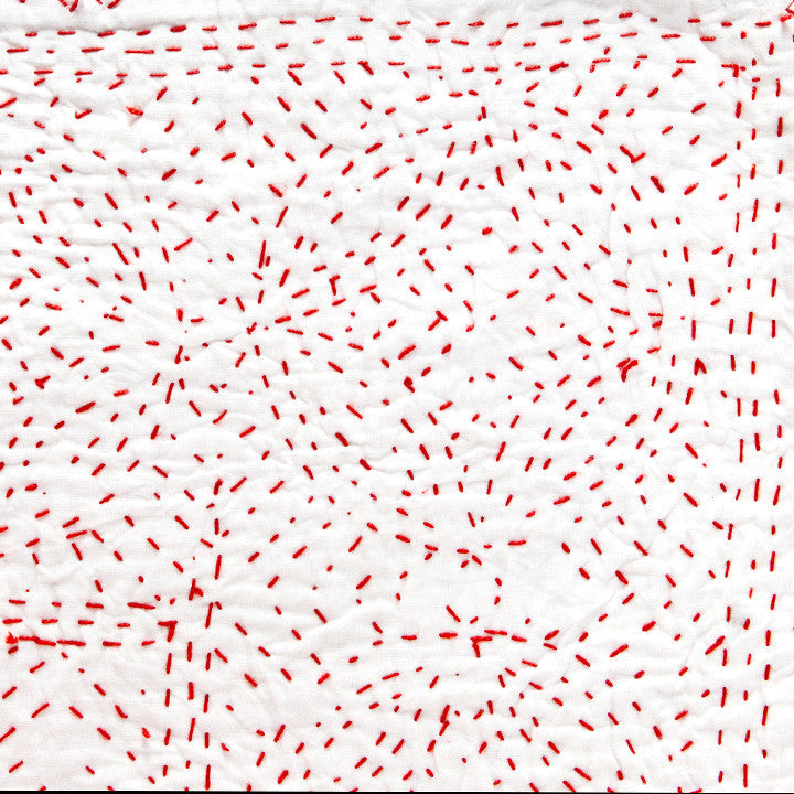 Red stitching on Snow
